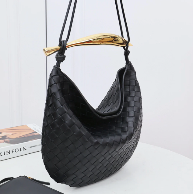 Medium leather bag with golden top