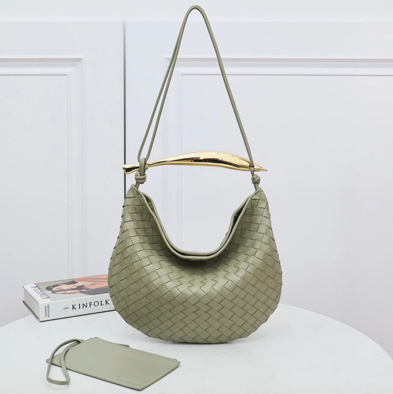 Medium leather bag with golden top