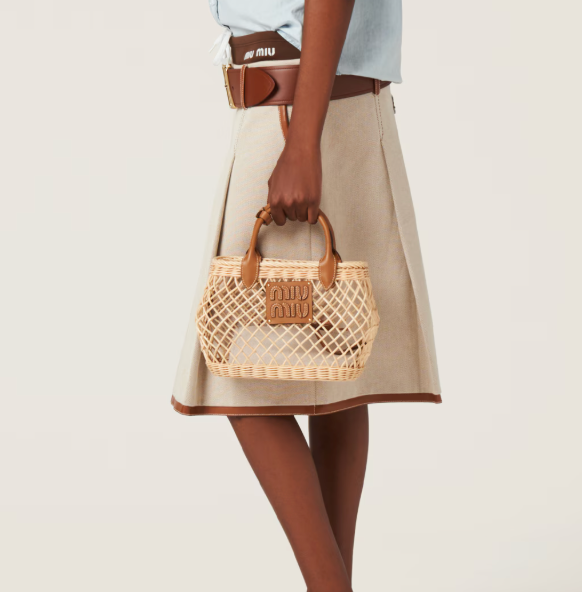 Woven handbag with leather trim