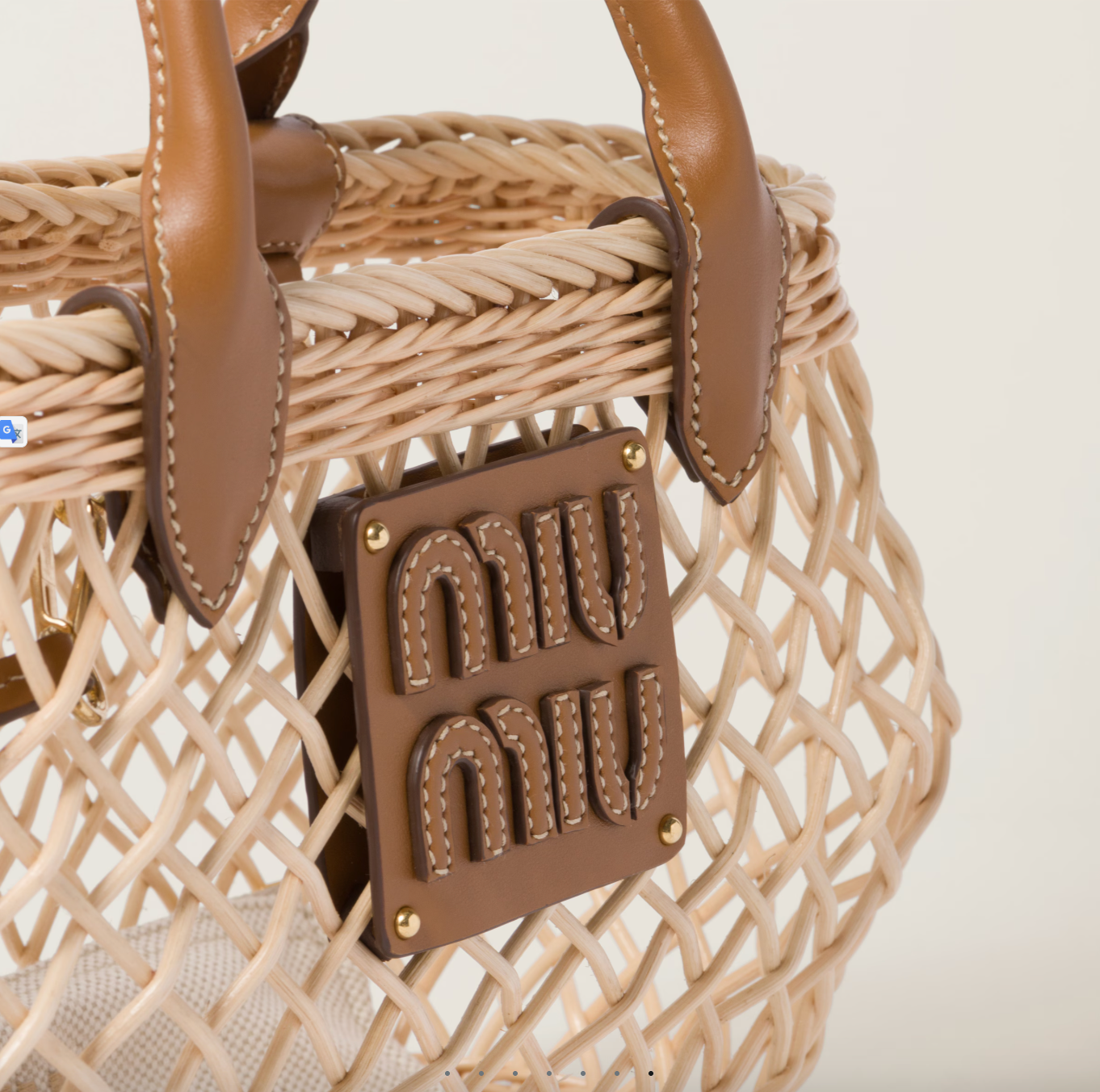 Woven handbag with leather trim