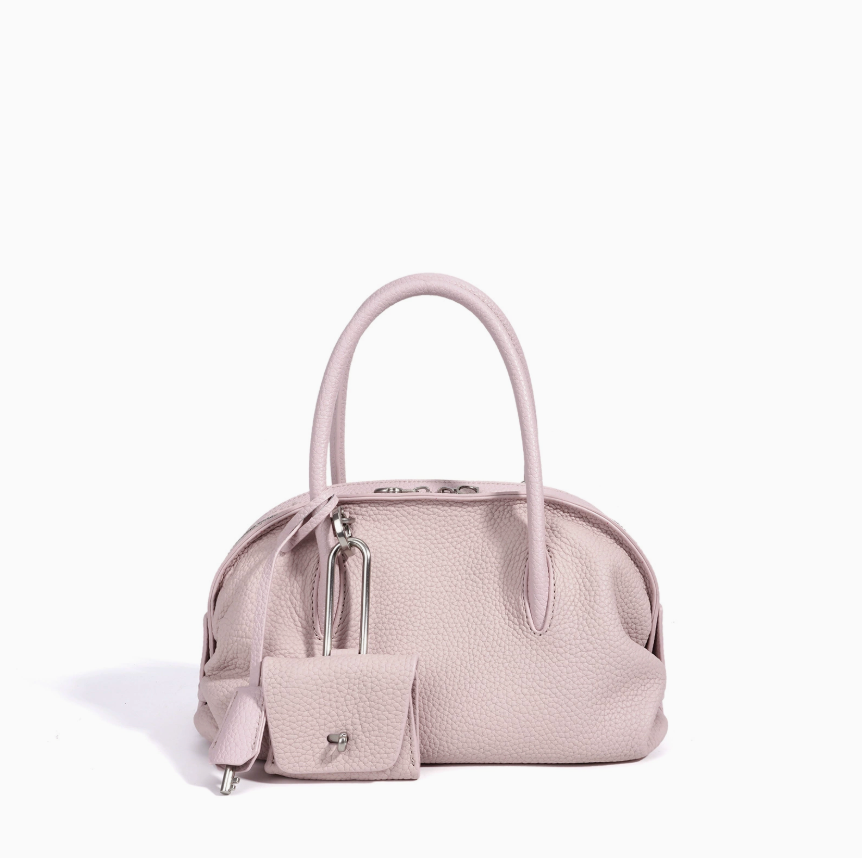 Light gray handbag with matching pouch on a white background