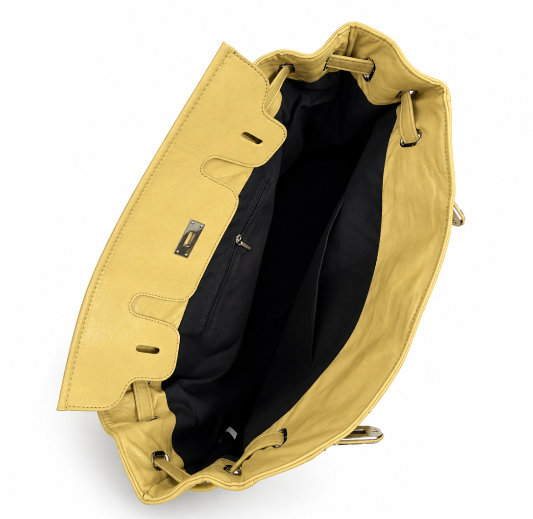 Inside the VENE Iconic Bag showing the black fabric lining