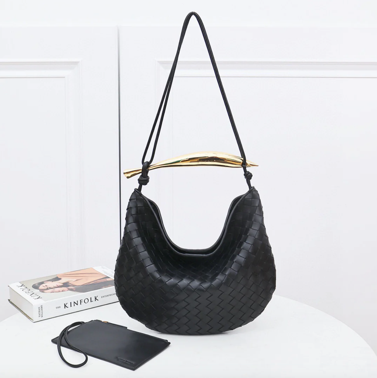 Medium leather bag with golden top