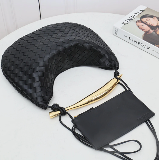 Medium leather bag with golden top