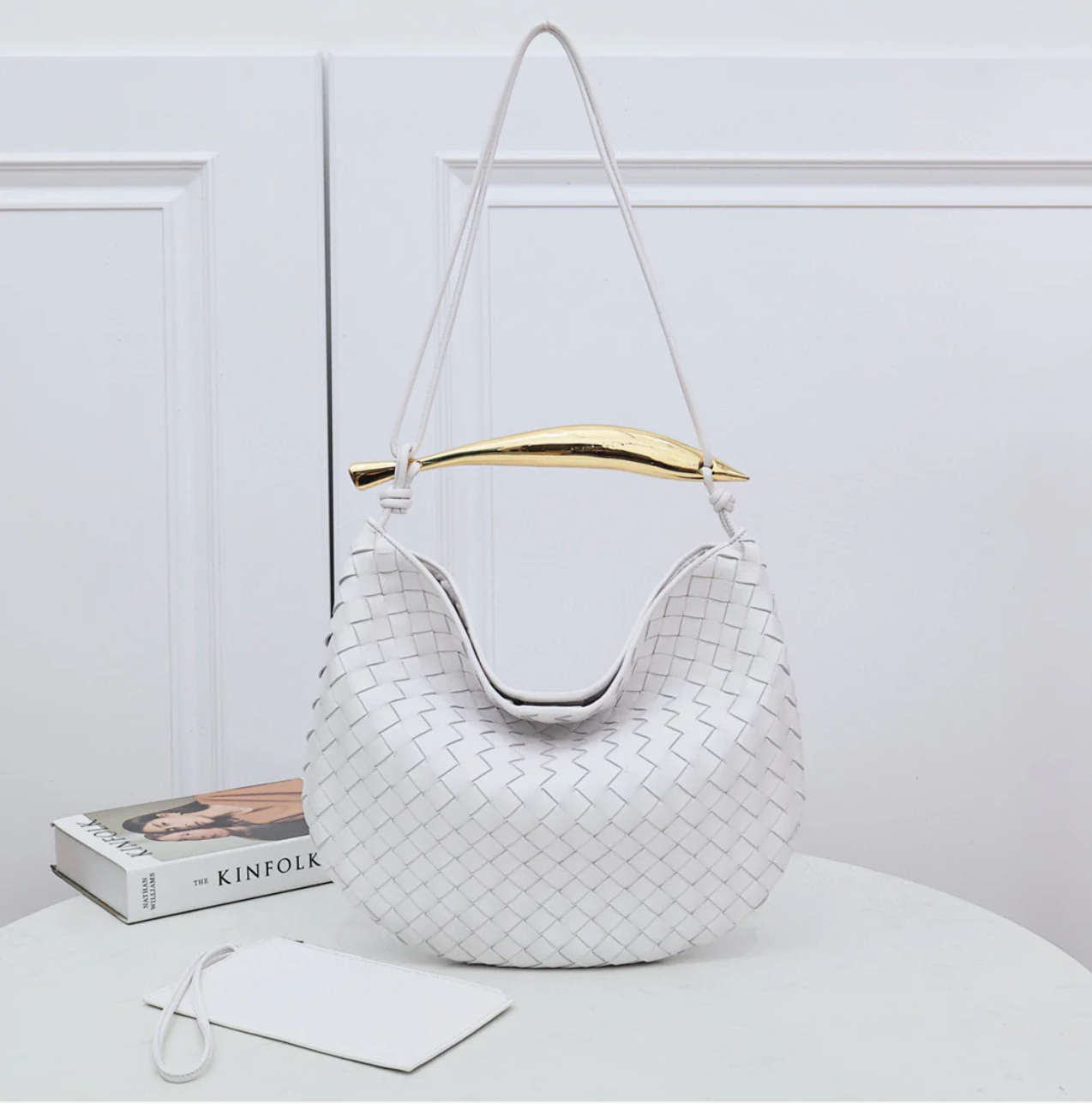 Medium leather bag with golden top