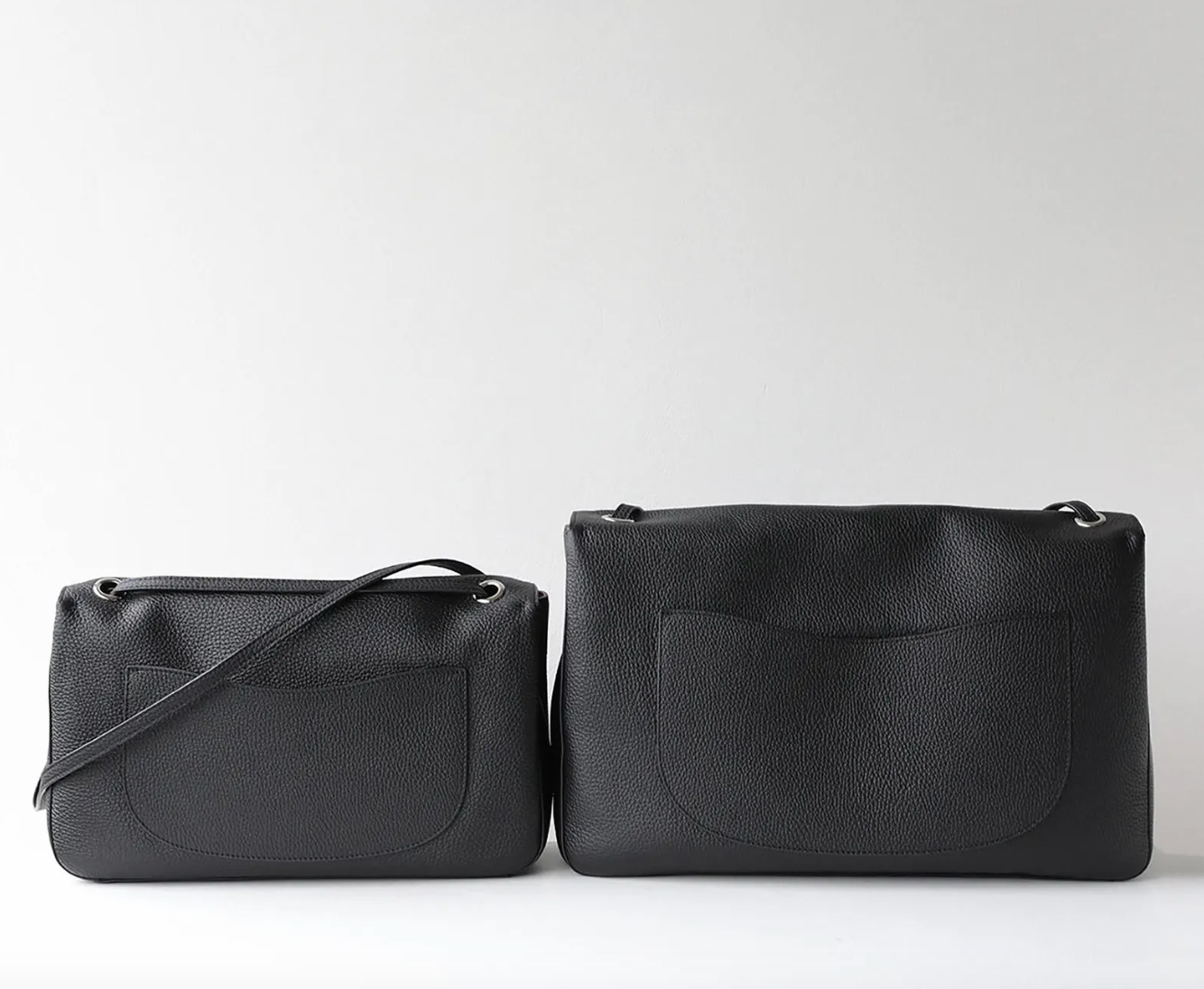 Interior of the Venebag Turn-Lock Crossbody showing zip, slot, and phone pockets