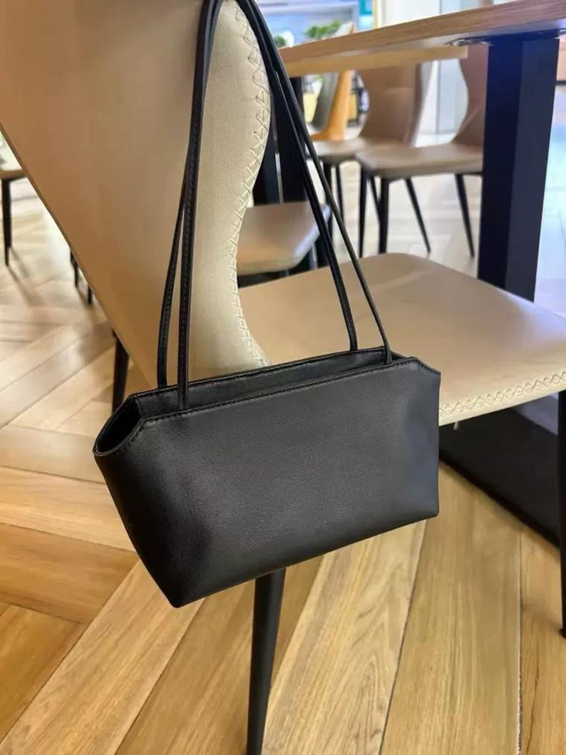 Interior of the Venebag Bare Shoulder Bag showing zip pocket